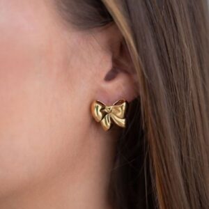 Statement strikjes studs GOUD